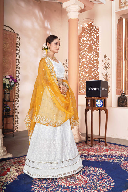 SnowWhite Women's Embroidered Georgette Lehenga Choli with Sequins Work